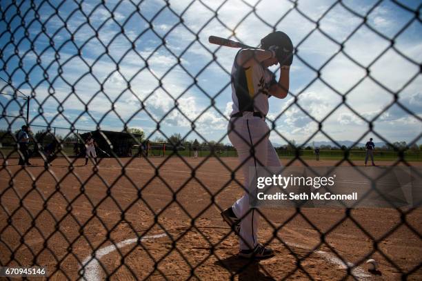 James Luehr of Prospect Ridge Academy warms up in the on deck circle during a game against SkyView Academy at Northwest Open Space on April 18 in...