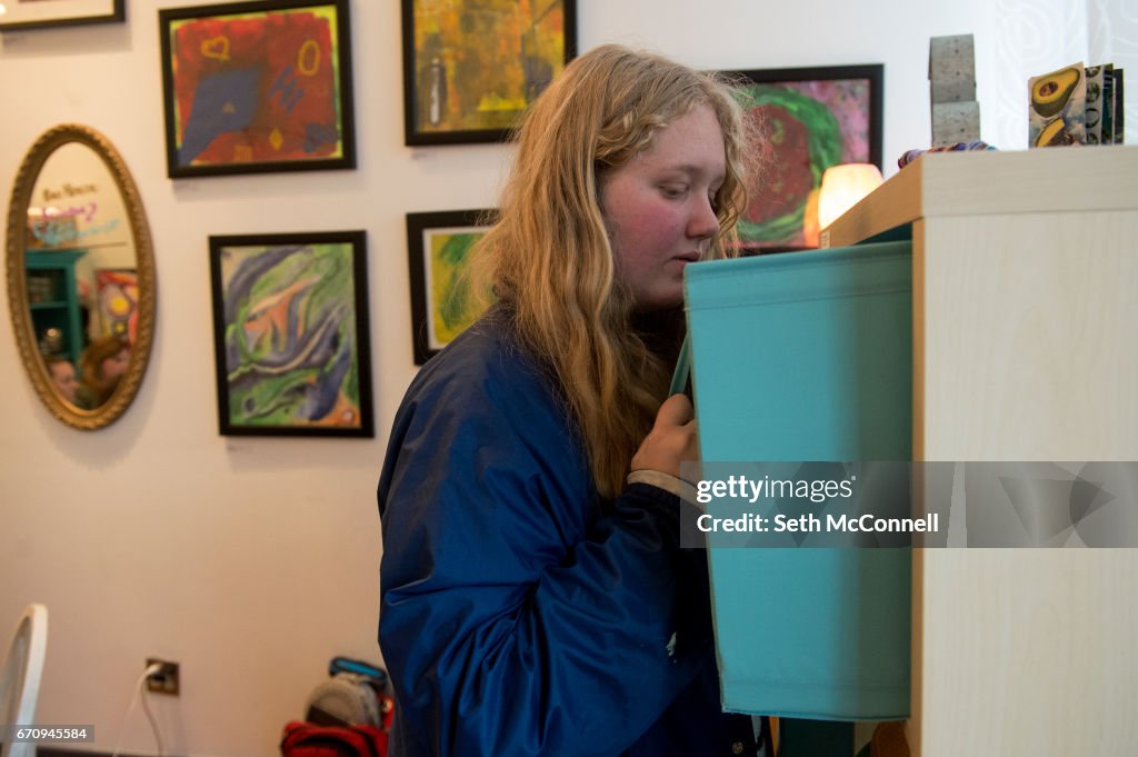 Aurelia Tittmann looks for art supplies during Lil Ladies Teen Art