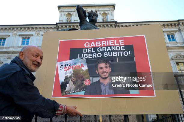 Banner to demand freedom for Gabriele Del Grande is shown during a rally to demand the release of the Italian journalist, blogger, writer and human...