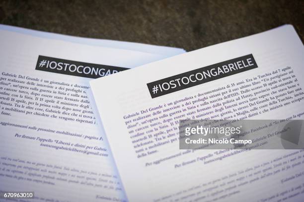 Flyers are pictured during a rally to demand the release of the Italian journalist, blogger, writer and human rights activist Gabriele Del Grande...
