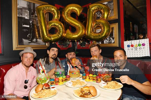 Singers Brian Littrell, Kevin Richardson, AJ McLean, Nick Carter and Howie Dorough of the Backstreet Boys attend the grand opening of Sugar Factory...