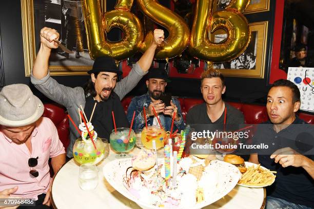 Singers Brian Littrell, Kevin Richardson, AJ McLean, Nick Carter and Howie Dorough of the Backstreet Boys attend the grand opening of Sugar Factory...