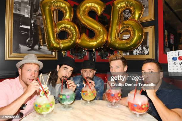 Singers Brian Littrell, Kevin Richardson, AJ McLean, Nick Carter and Howie Dorough of the Backstreet Boys attend the grand opening of Sugar Factory...