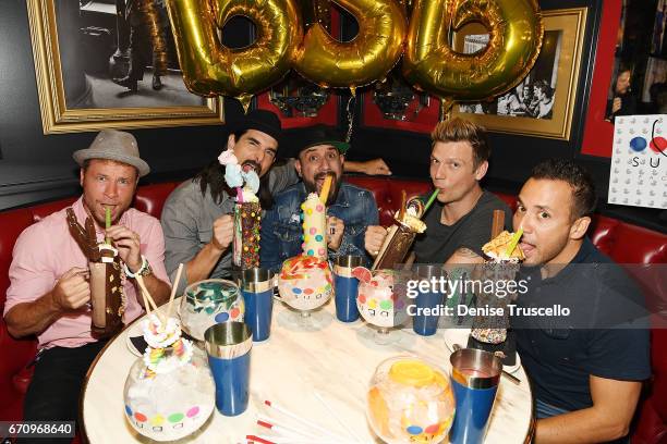 Singers Brian Littrell, Kevin Richardson, AJ McLean, Nick Carter and Howie Dorough of the Backstreet Boys attend the grand opening of Sugar Factory...