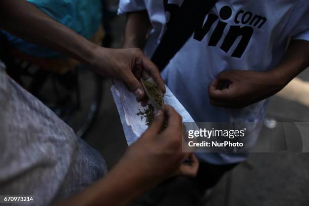 People smokes Marijuana joints during the 420 international day celebrated as well in Mexico City, April 2017.