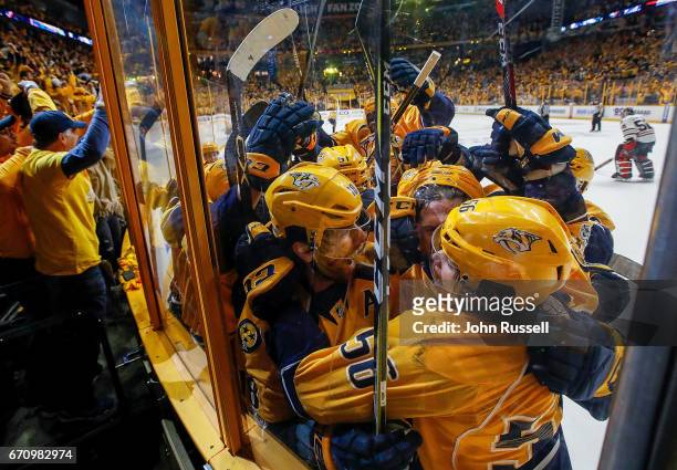 Kevin Fiala celebrates his game winner overtime goal with James Neal and the rest of the Nashville Predators against the Chicago Blackhawks in Game...