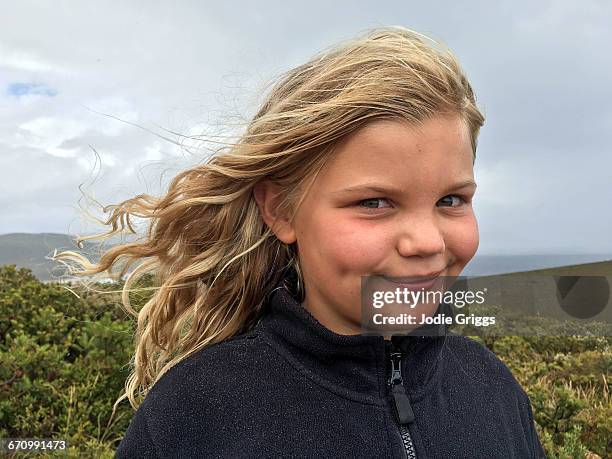 happy young girl with wind in her hair - day 10 imagens e fotografias de stock