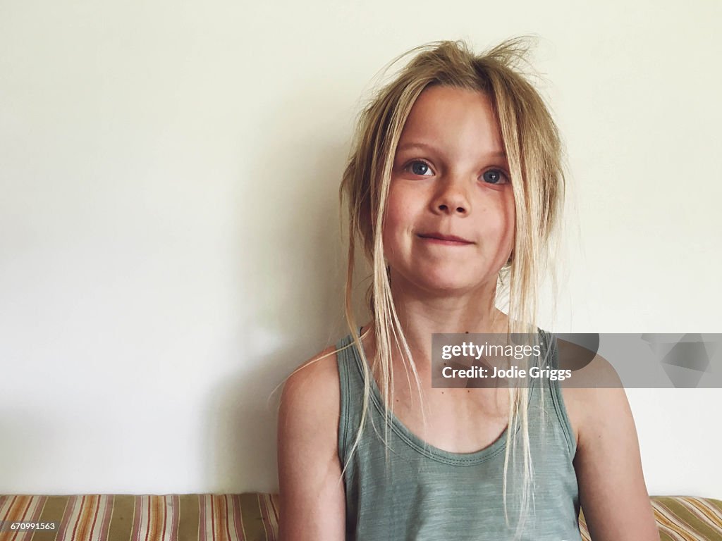 Young girl with scruffy hair