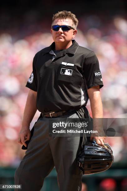 Umpire Greg Gibson looks on during a baseball game between the Washington Nationals and the Philadelphia Phillies at Nationals Park on April 16, 2017...