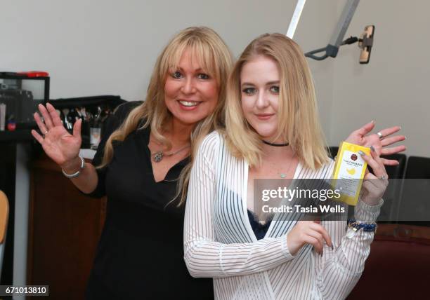 Hair stylist Tina Cassaday and musical artist/actress Mahkenna with Banana-Banana by Tina Cassaday Beverly Hills conditioner at A Day of IMPRESSIONS...