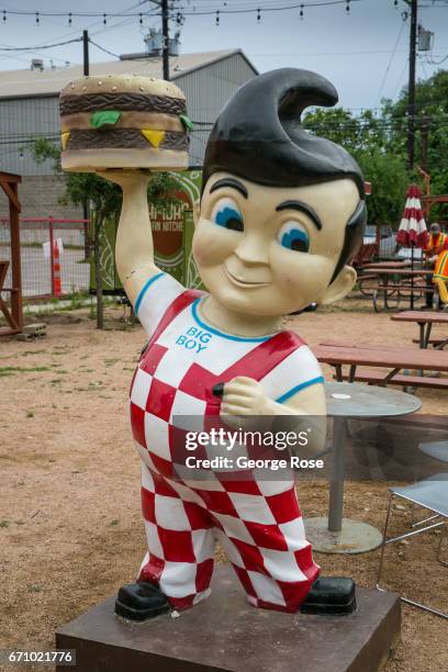 An iconic Bob's Big Boy restaurant mascot sculpture is displayed at a 6th Street food truck court on April 14 in Austin, Texas. Austin, the State...