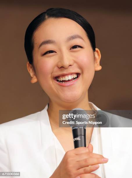 Mao Asada, three-time world figure skating champion and silver medalist at the 2010 Vancouver Olympics, smiles during the press conference to...