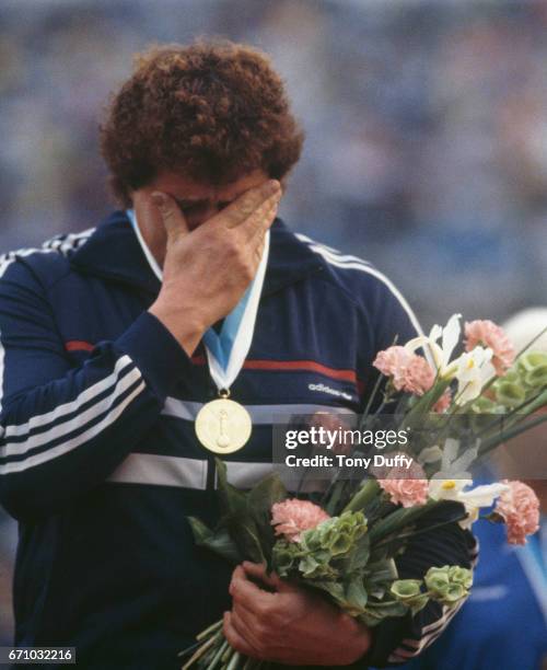 Helena Fibingerov of Czechoslovakia shows emotion on the podium after winning the gold medal for the Women's shot put event of the IAAF World...