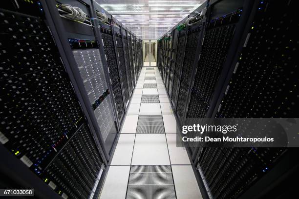 General view in the CERN Computer / Data Centre and server farm of the 1450 m2 main room during a behind the scenes tour at CERN, the World's Largest...