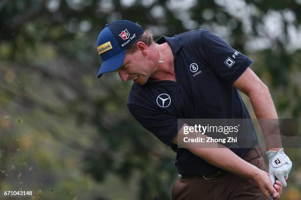 Marcel Siem of Germany reacts to a shot during the second round of the Shenzhen International at Genzon Golf Club on April 21, 2017 in Shenzhen,...