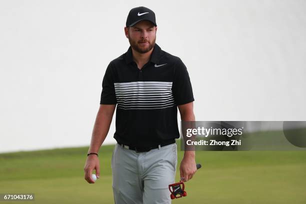 Jordan Smith of England reacts to a shot during the second round of the Shenzhen International at Genzon Golf Club on April 21, 2017 in Shenzhen,...