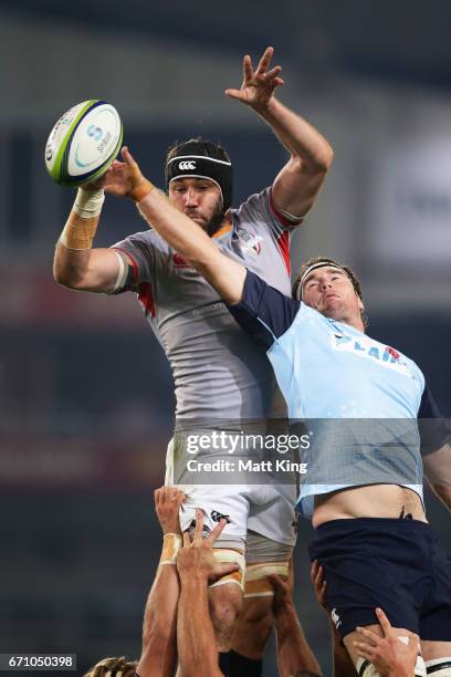 Wilhelm van der Sluys of the Kings jumps at the lineout next to David McDuling of the Waratahs during the round nine Super Rugby match between the...