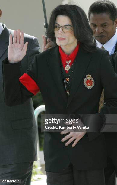 Pop star Michael Jackson waves to fans on leaving the Santa Barbara County Superior Court, in Santa Maria. Jurors in Jackson's child molestation...