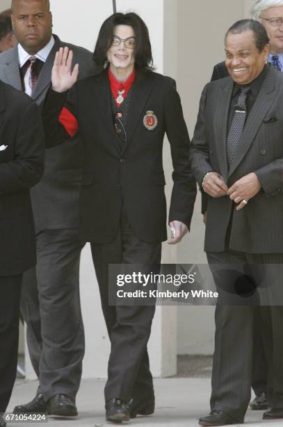 Pop star Michael Jackson waves to fans next to his father Joe , on leaving the Santa Barbara County Superior Court, in Santa Maria. Jurors in...