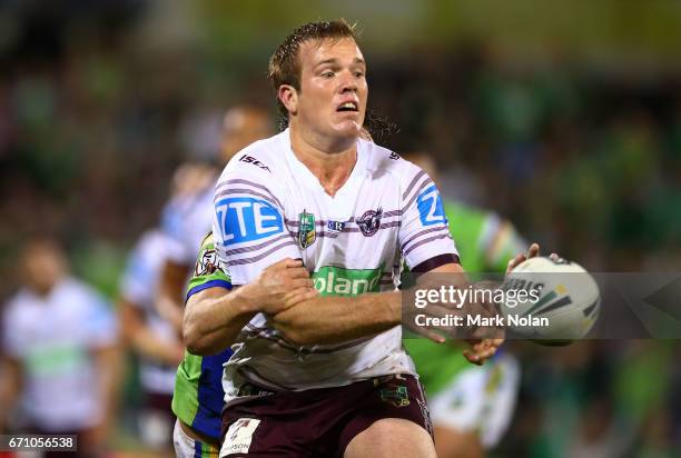 Jake Trbojevic of the Eagles offloads during the round eight NRL match between the Canberra Raiders and the Manly Sea Eagles at GIO Stadium on April...