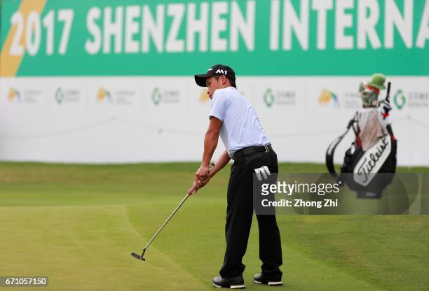 Ren Han of China plays a shot during the second round of the Shenzhen International at Genzon Golf Club on April 21, 2017 in Shenzhen, China.
