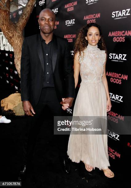 Chris Obi and Gloria Huwiler attend the premiere of Starz's 'American Gods' at ArcLight Cinemas Cinerama Dome on April 20, 2017 in Hollywood,...
