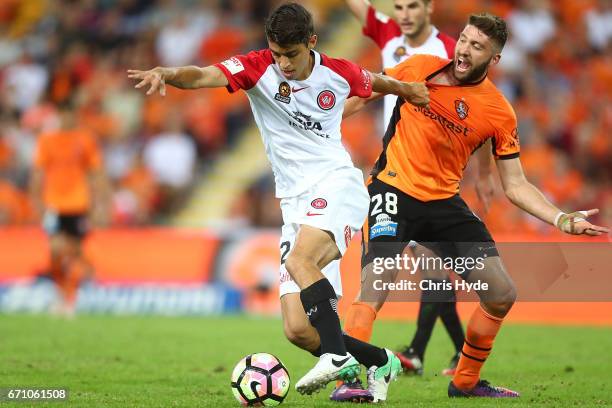 Scott Neville of the Wanderers and Brandon Borello of the Roar compete for the ball during the A-League Elimination Final match between the Brisbane...