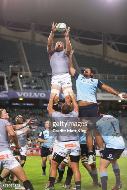 Irne Herbst of the Kings jumps at the lineout against Will Skelton of the Waratahs during the round nine Super Rugby match between the Waratahs and...