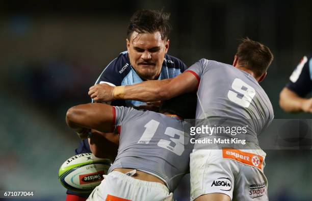 Angus Ta'avao of the Waratahs drops the ball in a tackle during the round nine Super Rugby match between the Waratahs and the Kings at Allianz...