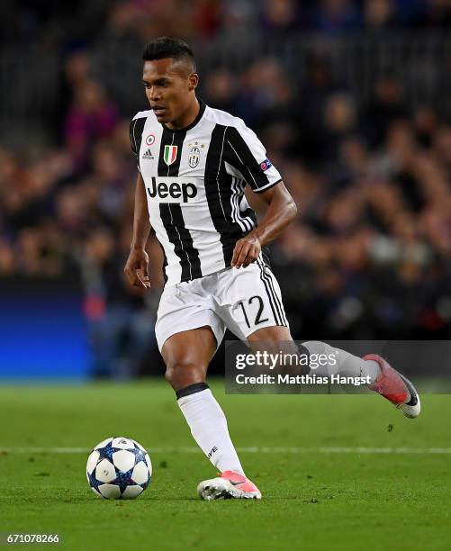 Alex Sandro of Juventus controls the ball during the UEFA Champions League Quarter Final second leg match between FC Barcelona and Juventus at Camp...