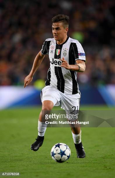 Paulo Dybala of Juventus controls the ball during the UEFA Champions League Quarter Final second leg match between FC Barcelona and Juventus at Camp...