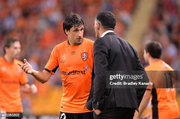 Thomas Broich of the Roar talks tactics with Coach John Aloisi during the A-League Elimination Final match between the Brisbane Roar and the Western...