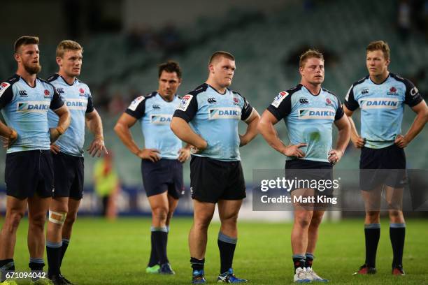 Waratah players look dejected at fulltime during the round nine Super Rugby match between the Waratahs and the Kings at Allianz Stadium on April 21,...