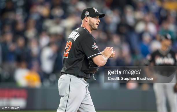 Relief pitcher Dustin McGowan of the Miami Marlins walks to the pitcher's mound during a game Seattle Mariners at Safeco Field on April 19, 2017 in...