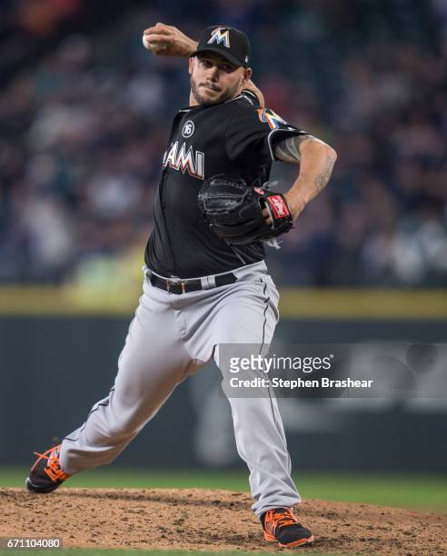 Reliever Dustin McGowan of the Miami Marlins delivers a pitch during a game Seattle Mariners at Safeco Field on April 19, 2017 in Seattle,...