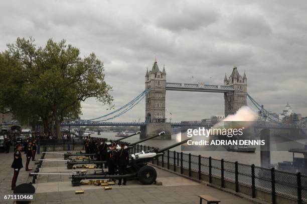 The Honourable Artillery Company fire a 62 gun salute against a backdrop of London's Tower Bridge, on April 21 as Britain's Queen Elizabeth II...