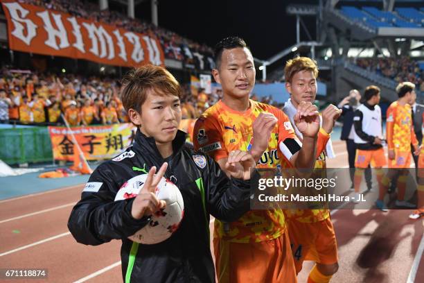 Shota Kaneko of Shimizu S-Pulse celebrates he scored the J.League J1 20,000th goal with his team mates Chong Tese and Gakuto Notsuda after J.League...