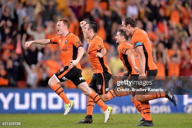 Roar players celebrate victory after an extra time shoot out during the A-League Elimination Final match between the Brisbane Roar and the Western...