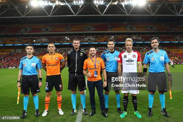 Players and officials pose after the coin toss during the A-League Elimination Final match between the Brisbane Roar and the Western Sydney Wanderers...