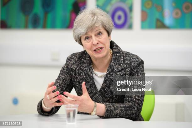 Prime Minster Theresa May talks to students and first-time voters at Cox Green School on April 21, 2017 in Maidenhead, England. In an attempt to gain...