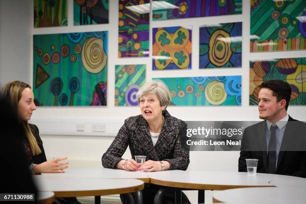Prime Minster Theresa May talks to students and first-time voters at Cox Green School on April 21, 2017 in Maidenhead, England. In an attempt to gain...