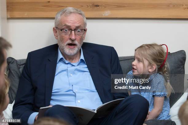 Labour party leader Jeremy Corbyn reads the book 'We're Going on a Bear Hunt' to children at a visit to Brentry ChildrenÕs Centre, on April 21, 2017...