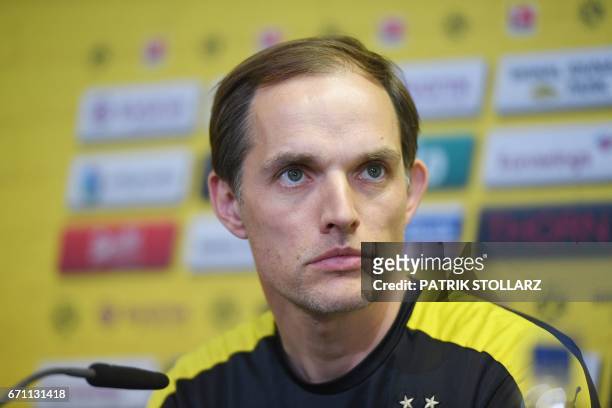 Dortmund's head coach Thomas Tuchel answers questions during a press conference in Brackel near Dortmund, western Germany, on April 21 on the eve of...