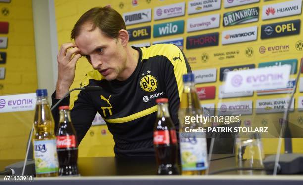 Dortmund's head coach Thomas Tuchel answers questions during a press conference in Brackel near Dortmund, western Germany, on April 21 on the eve of...