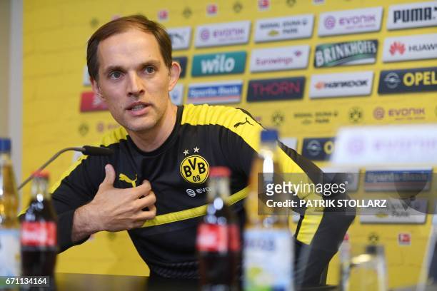 Dortmund's head coach Thomas Tuchel answers questions during a press conference in Brackel, on April 21, 2017 on the eve of the German league...