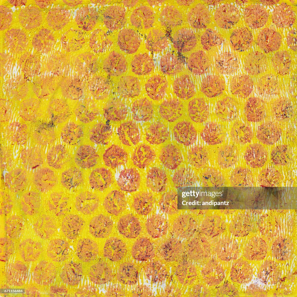 Yellow and orange spotted grunge texture pattern