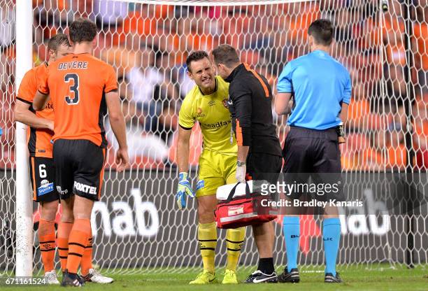 Michael Theo of the Roar is injured during the A-League Elimination Final match between the Brisbane Roar and the Western Sydney Wanderers at Suncorp...