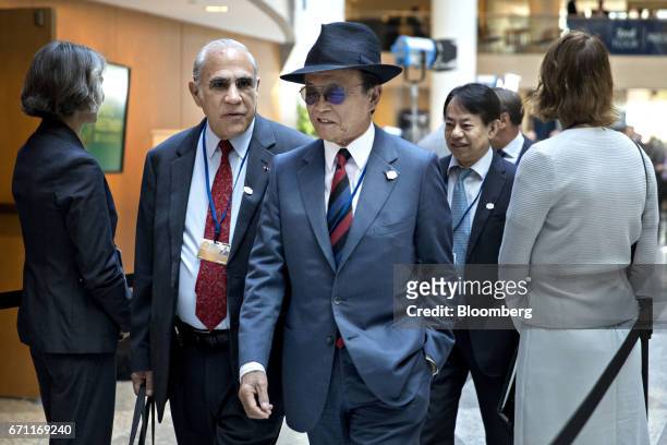 Taro Aso, Japan's finance minister, center, arrives to a Group of 20 finance ministers and central bank governors meeting on the sidelines of the...