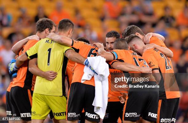 Roar players embrace before the A-League Elimination Final match between the Brisbane Roar and the Western Sydney Wanderers at Suncorp Stadium on...