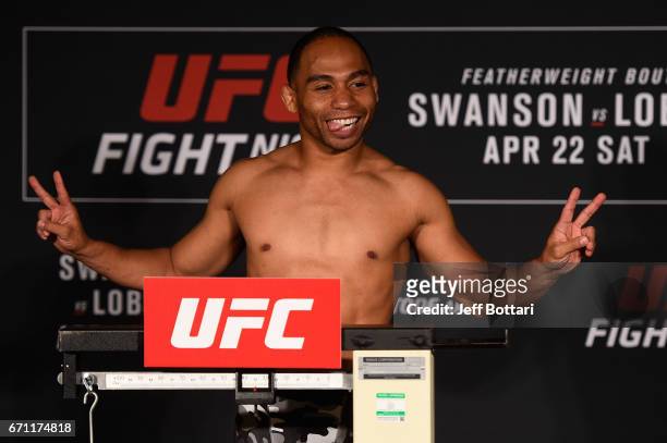 John Dodson poses on the scale during the UFC Fight Night weigh-in at the Sheraton Music City Hotel on April 21, 2017 in Nashville, Tennessee.
